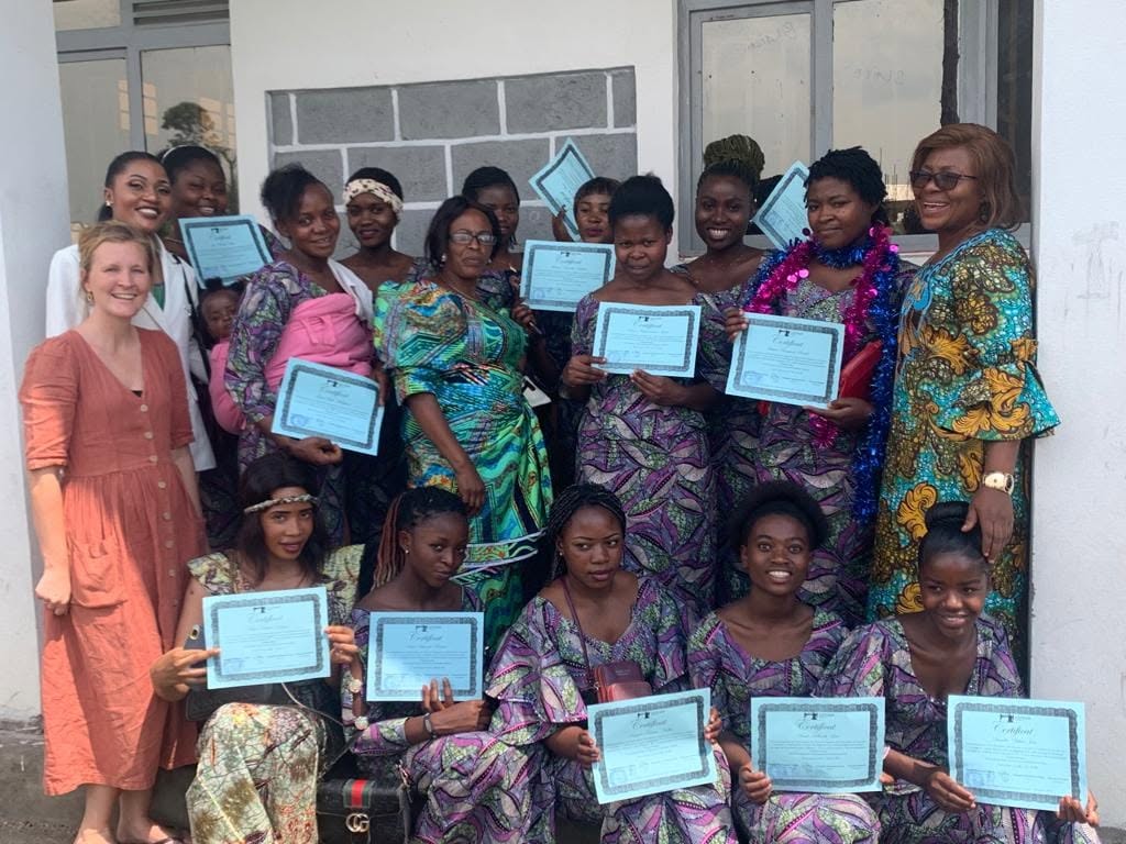 Esther Project graduation with sewing machines awarded